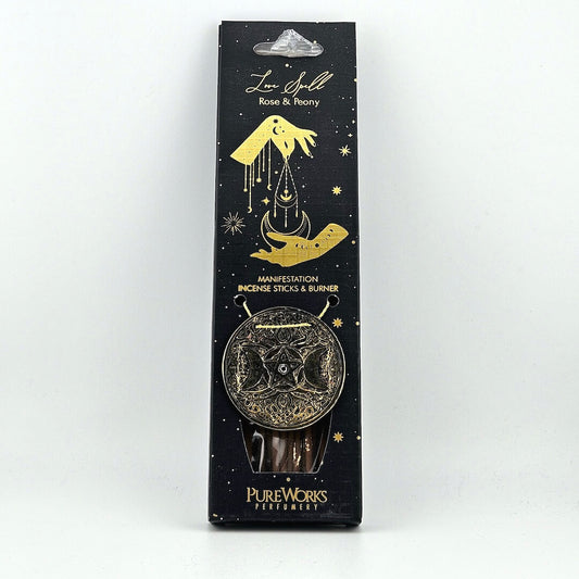 Packaged incense sticks and burner set with decorative design on a white background