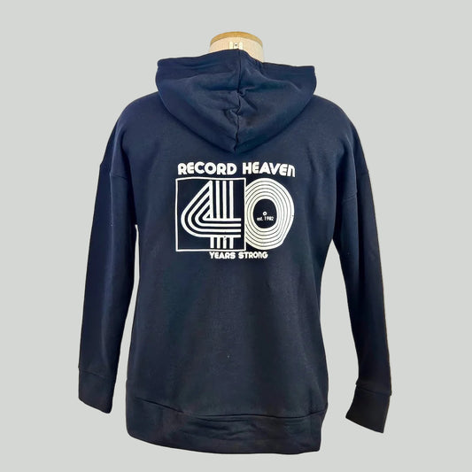 Black hoodie on mannequin with white logo for "Record Heaven, 40 Years Strong."