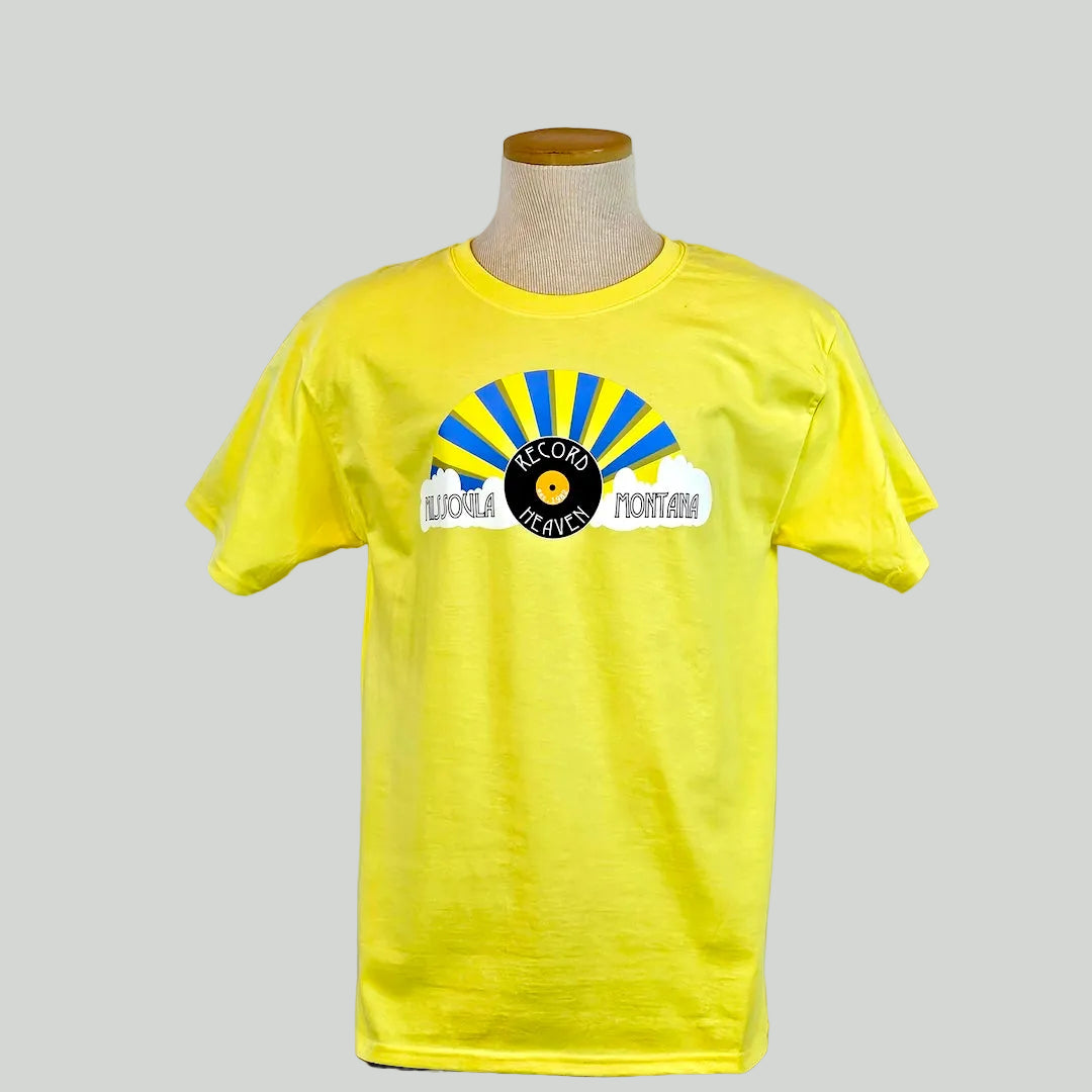 Yellow t-shirt with a graphic design on a mannequin against a plain background