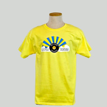 Yellow t-shirt with a graphic design on a mannequin against a plain background