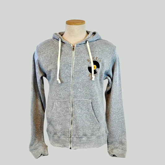 Gray zip-up hoodie with a logo on a mannequin against a gray background
