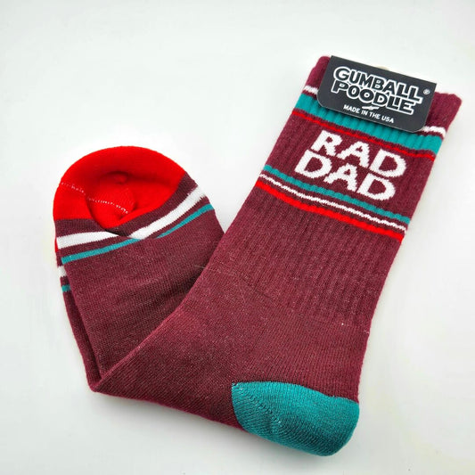 maroon socks with red, white, blue toe, heel, stripes, and text "RAD DAD."