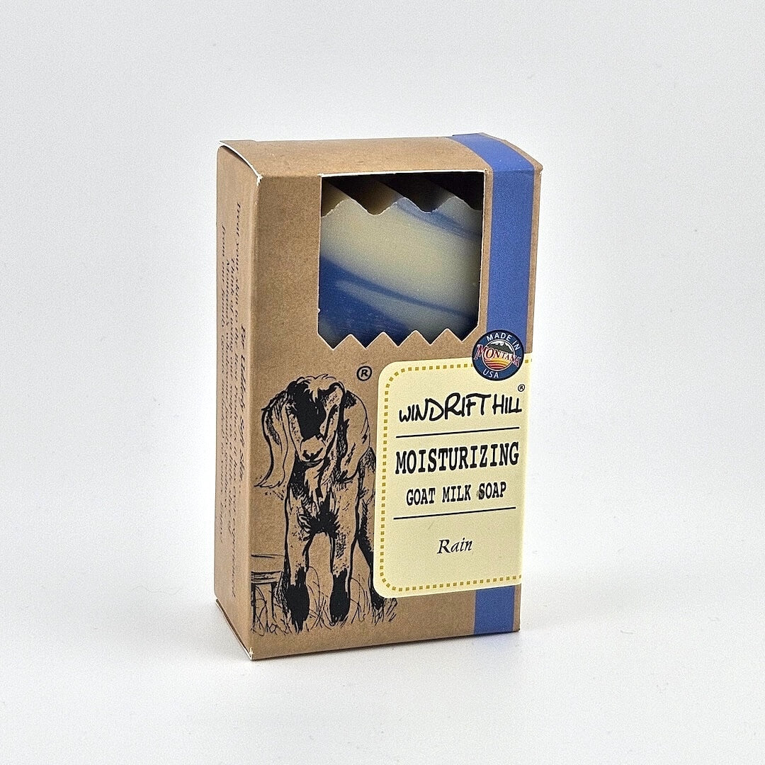Box of Windrift Hill moisturizing goat milk soap on a gray background