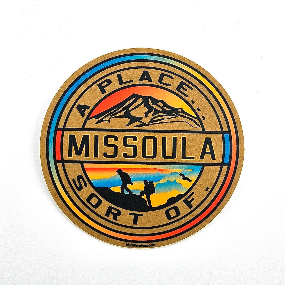 Round sticker with 'Missoula' and mountain design on a white background