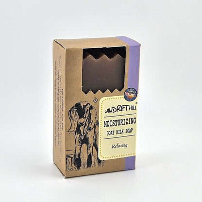 Box of Windrift Hill moisturizing goat milk soap on a gray background