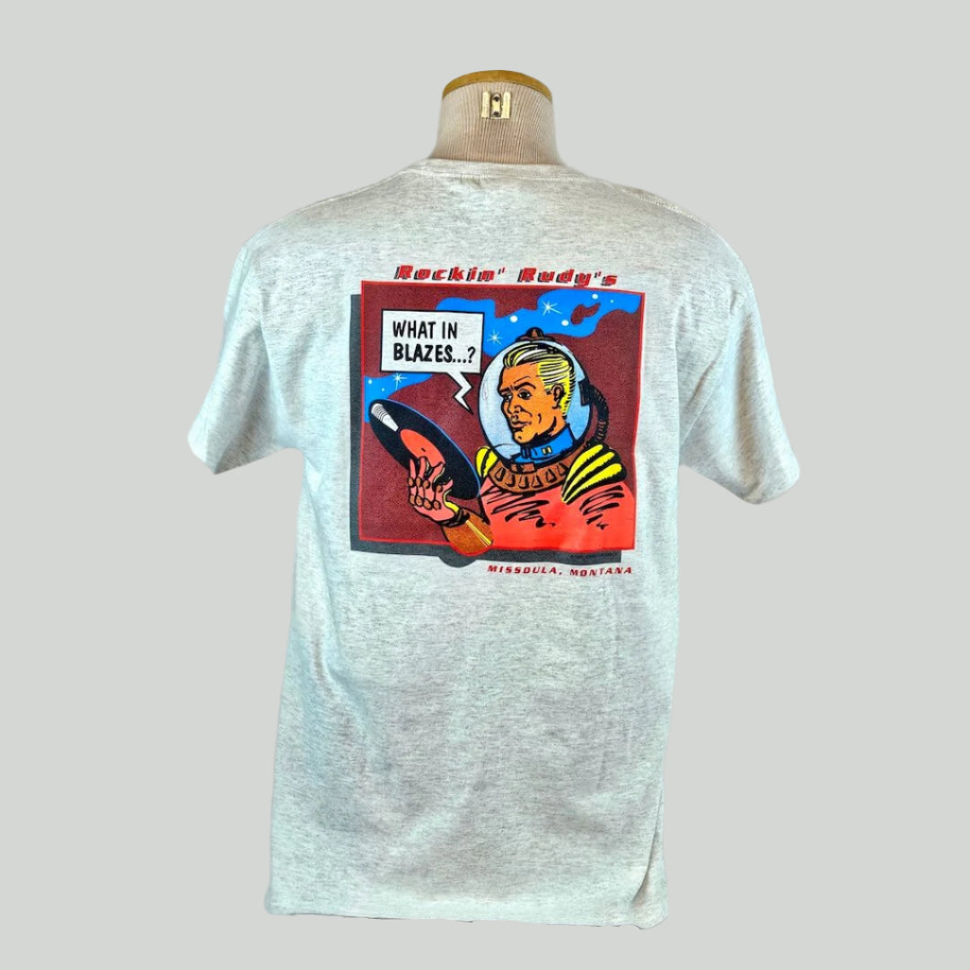 Gray t-shirt with graphic design on a mannequin against a white background