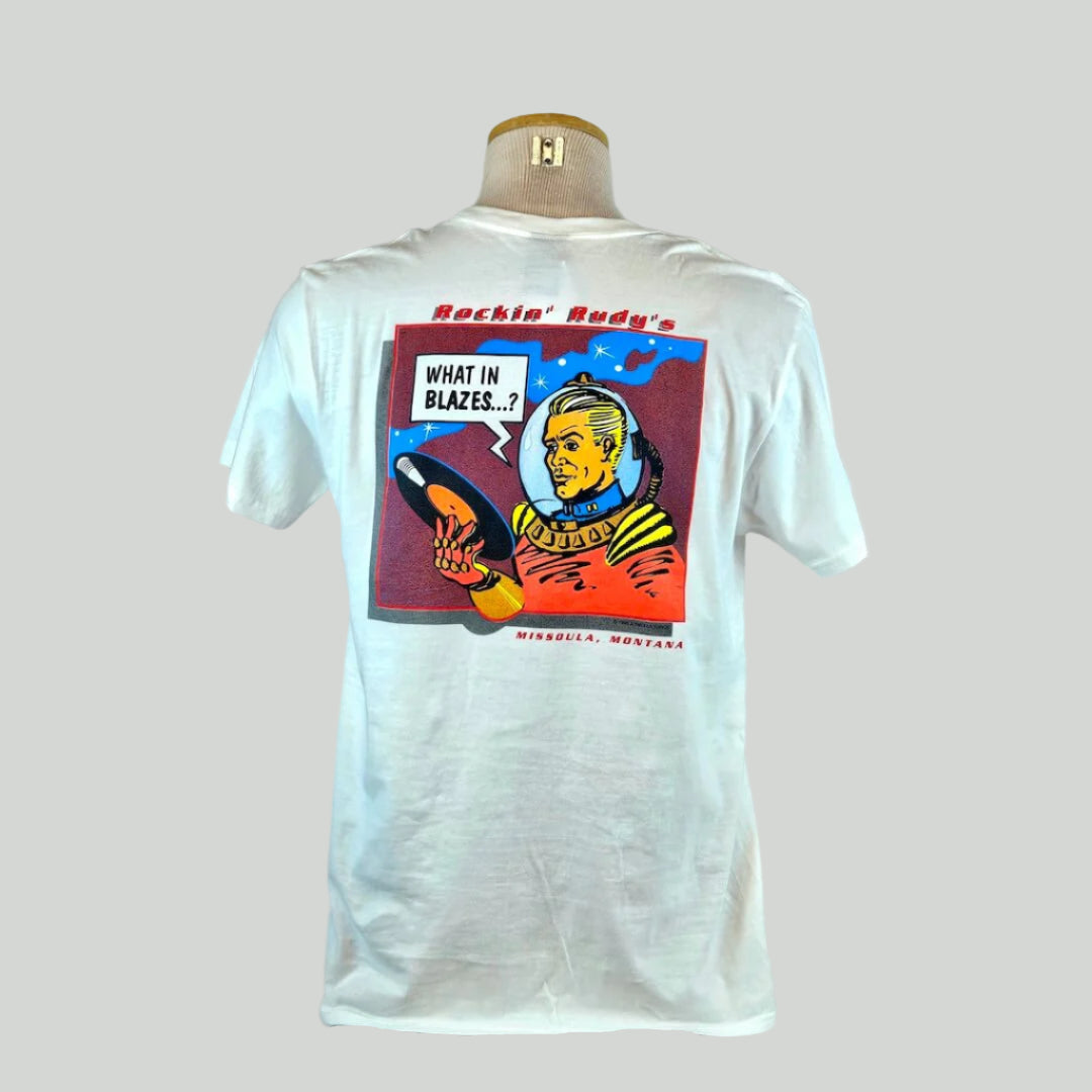 White t-shirt with graphic design on a mannequin against a white background