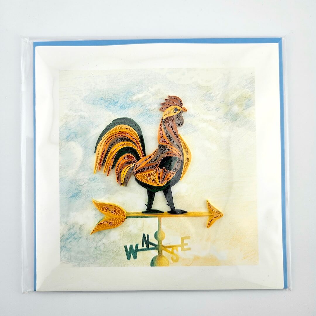 Decorative greeting card with a rooster on a weather vane design.
