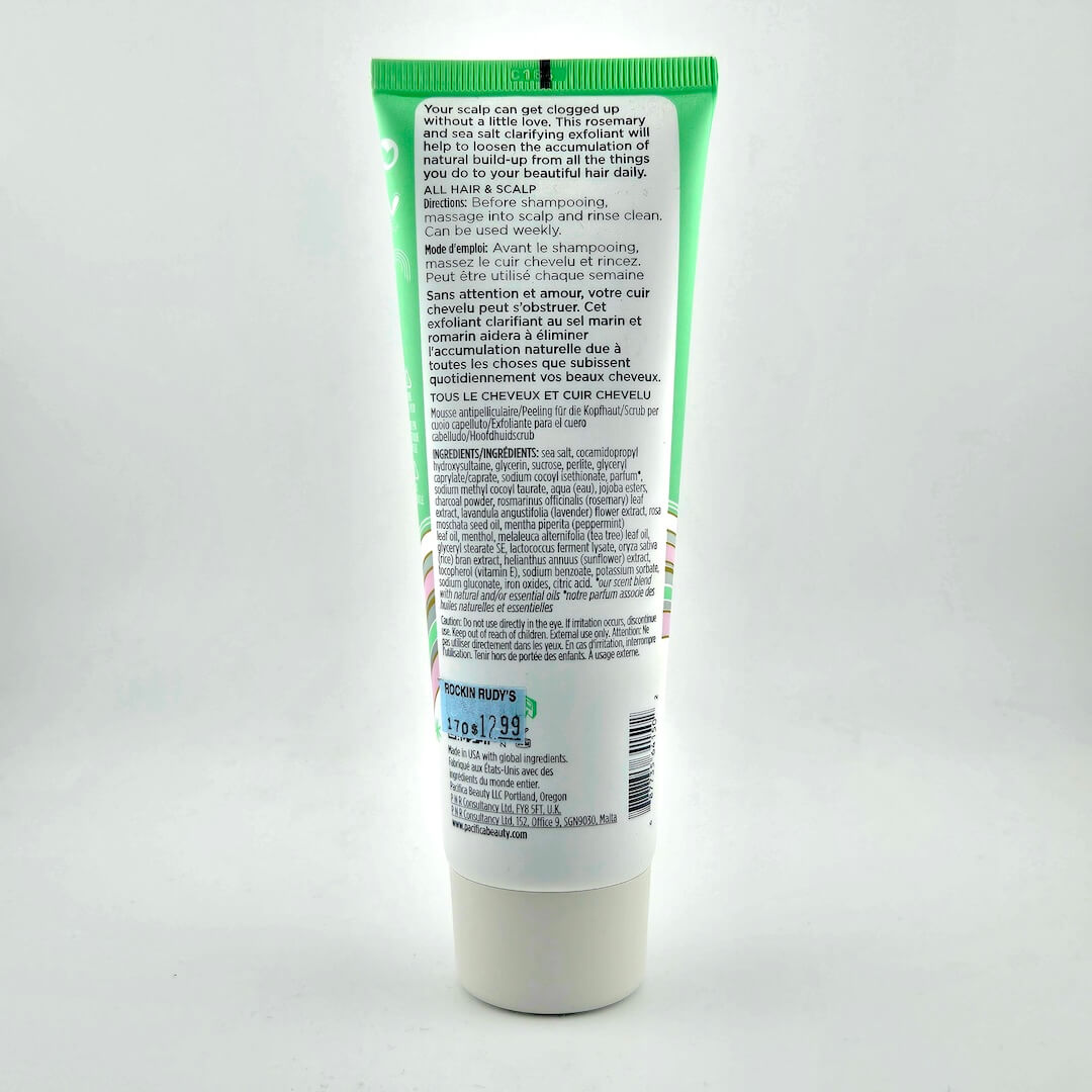 Tube of shampoo with green label on a white background
