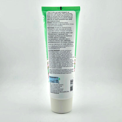 Tube of shampoo with green label on a white background