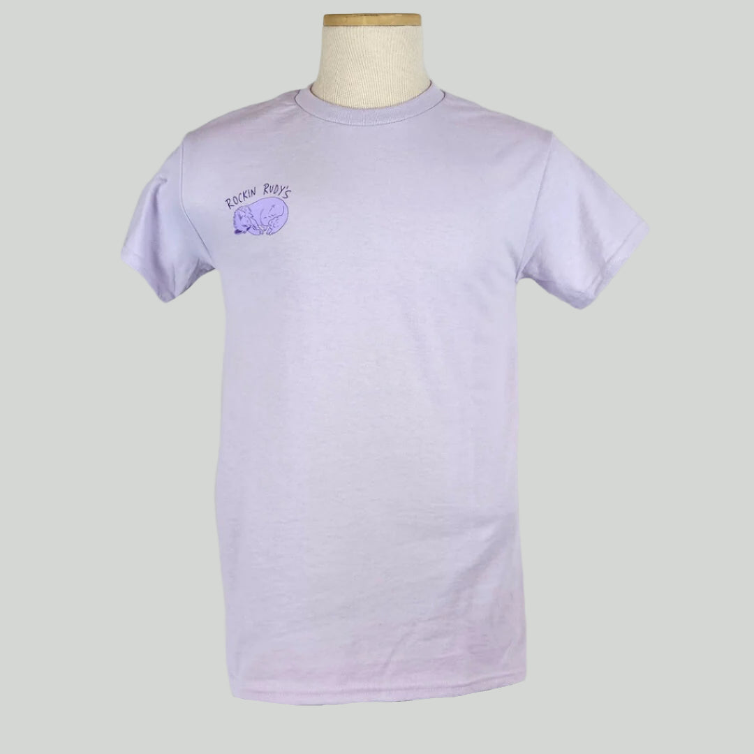 Lavender t-shirt with purple curled up cat on  left breast below "Rockin Rudy's."