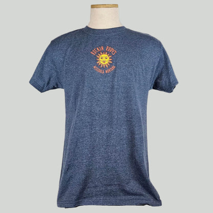Heathered navy colored t-shirt with small sun in center with "ROCKIN RUDY'S" & "MISSOULA, MONTANA" encircling it. 