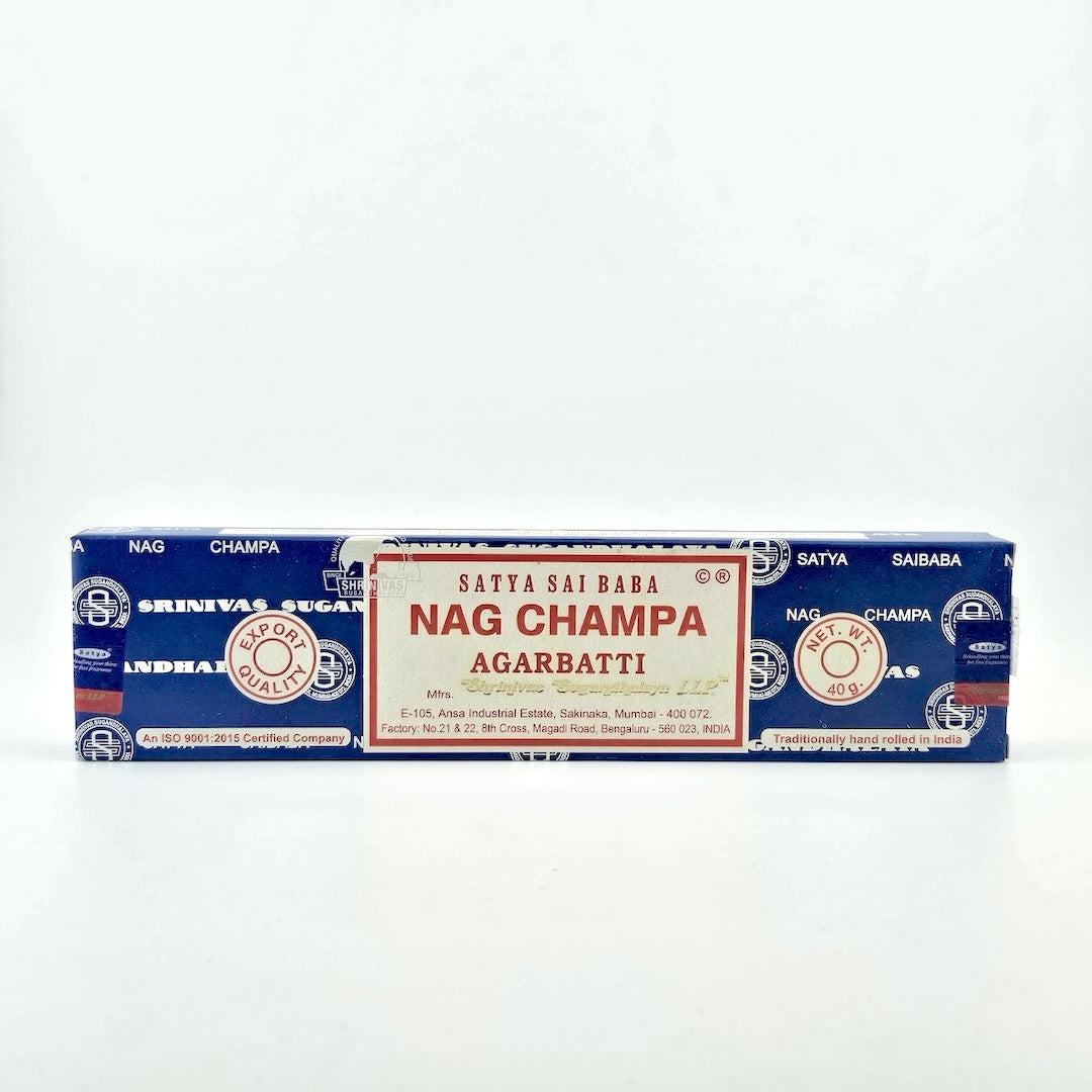 Blue box with white company name printed all over, white label with red border & red printed product info.