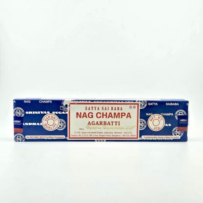 Blue box with white company name printed all over, white label with red border & red printed product info.