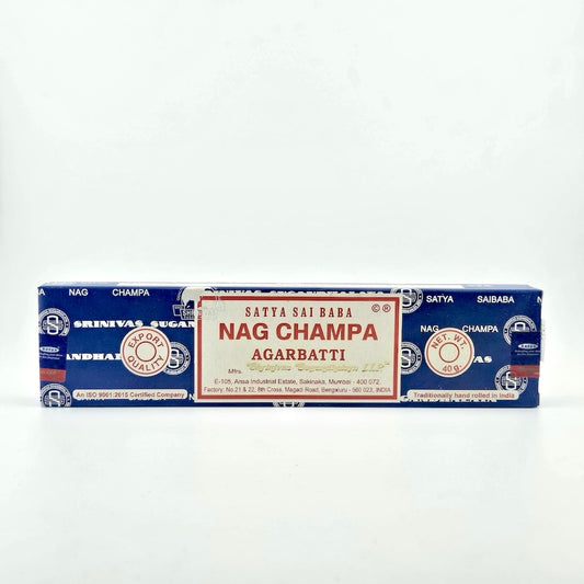 Blue box with white company name printed all over, white label with red border & red printed product info.