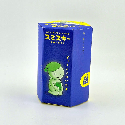 Blue box with a green character on a white background