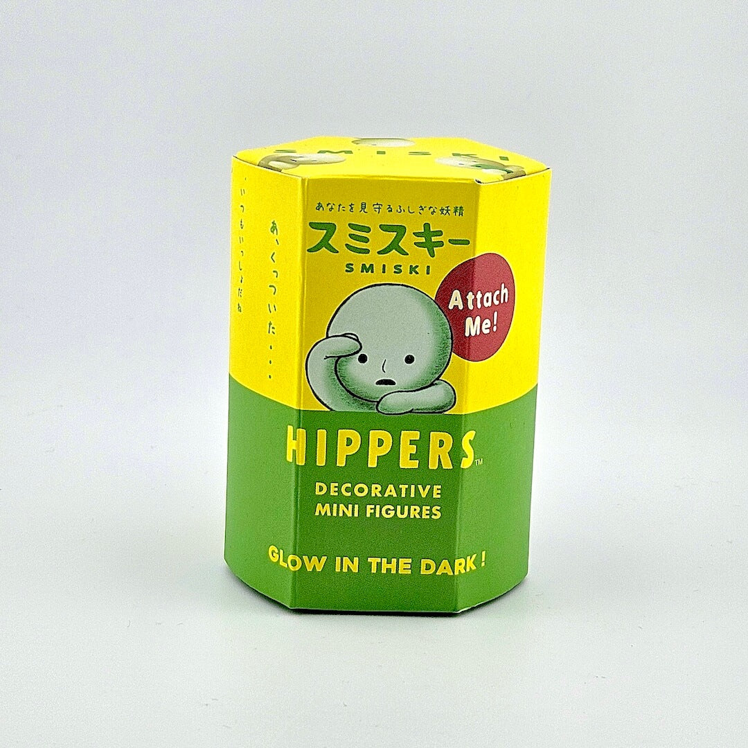 Box of Hippers decorative mini figures with a green and yellow design on a white background