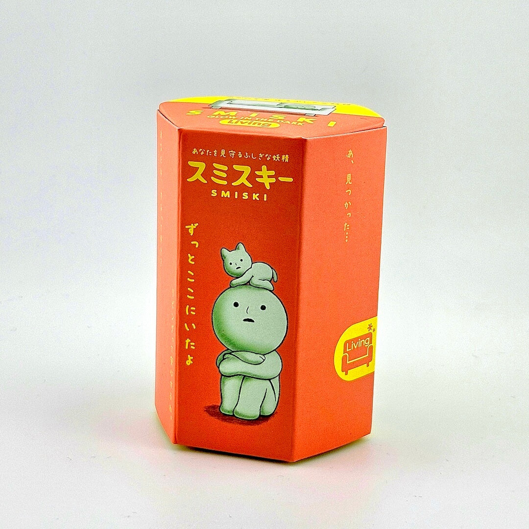 Red box with cartoon character and 'SMISKI' branding on a white background