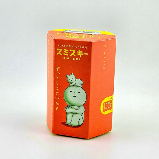 Red box with cartoon character and 'SMISKI' branding on a white background