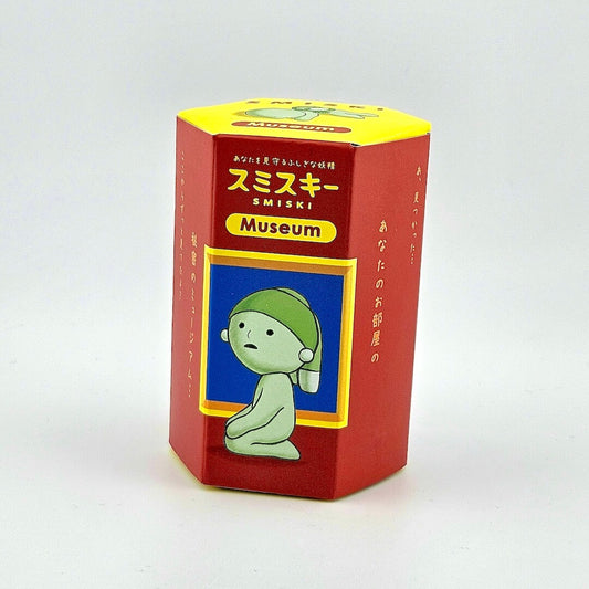 SMISKI Museum packaging with a cartoon character on a white background