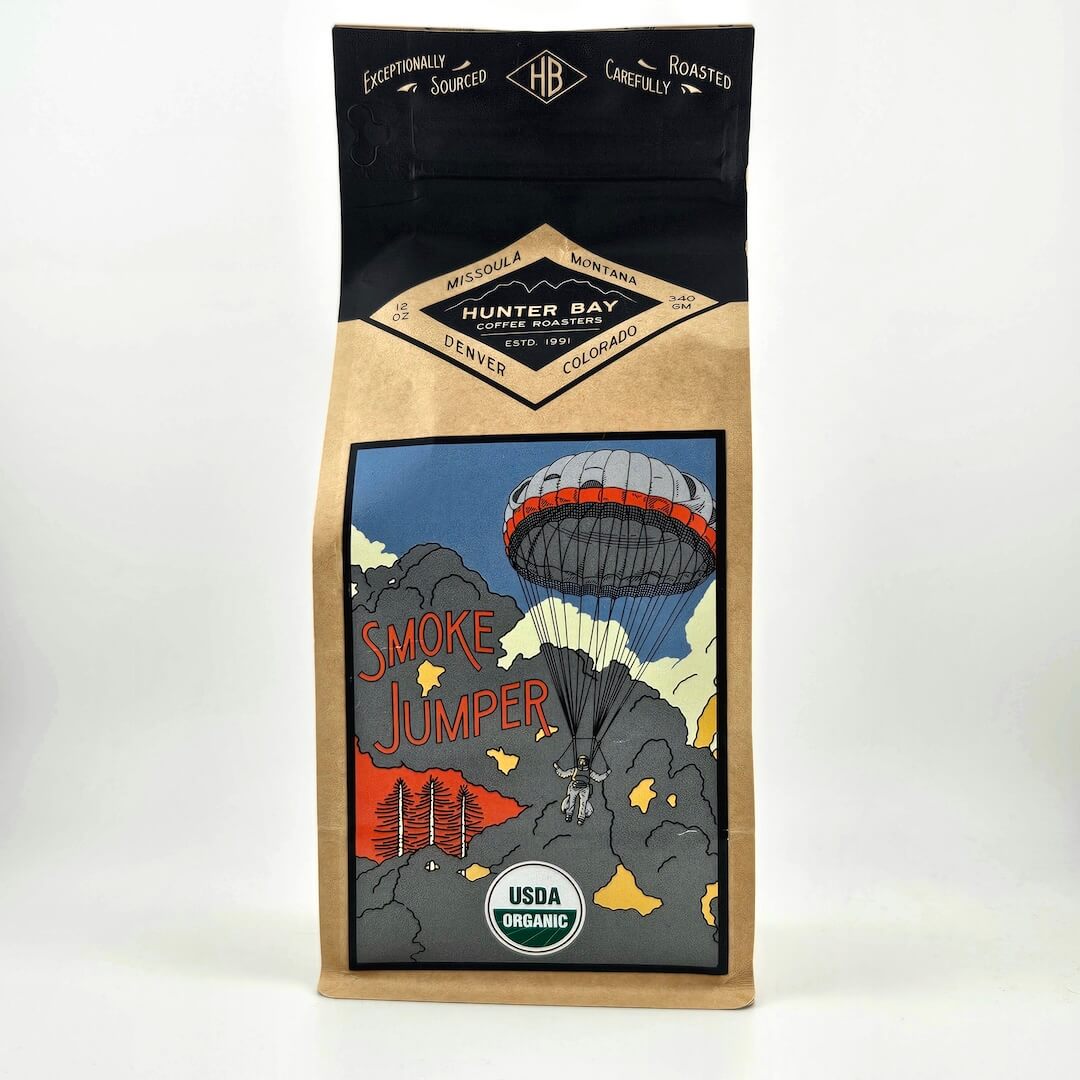 Coffee bag with 'Smoke Jumper' design and branding on a white background