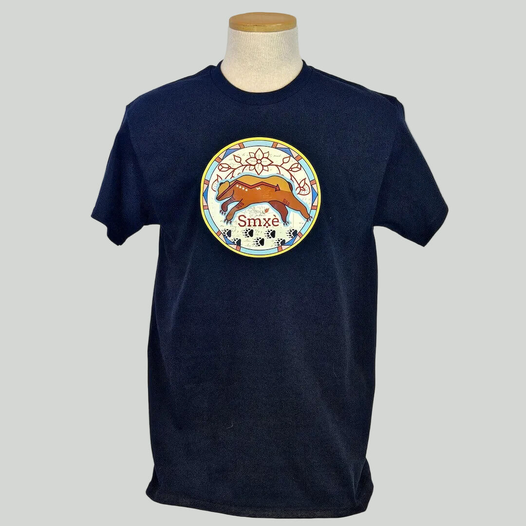 Navy blue t-shirt with a colorful graphic on a mannequin against a white background