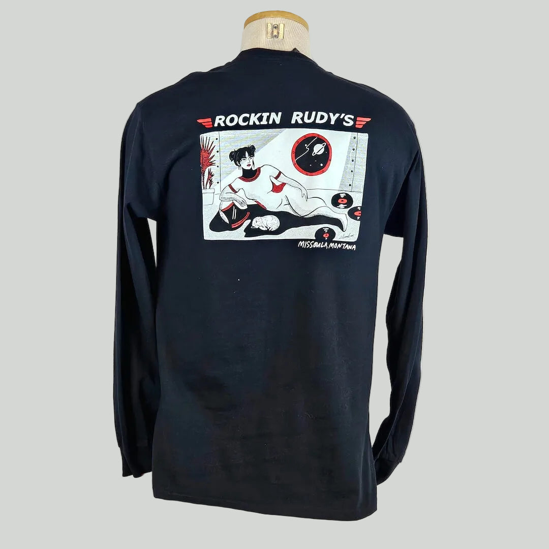 Black long-sleeve shirt with graphic design on a mannequin against a white background
