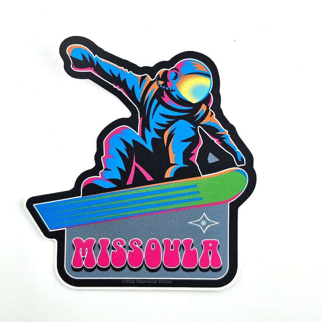 Colorful sticker with a snowboarder and 'Missoula' text on a white background
