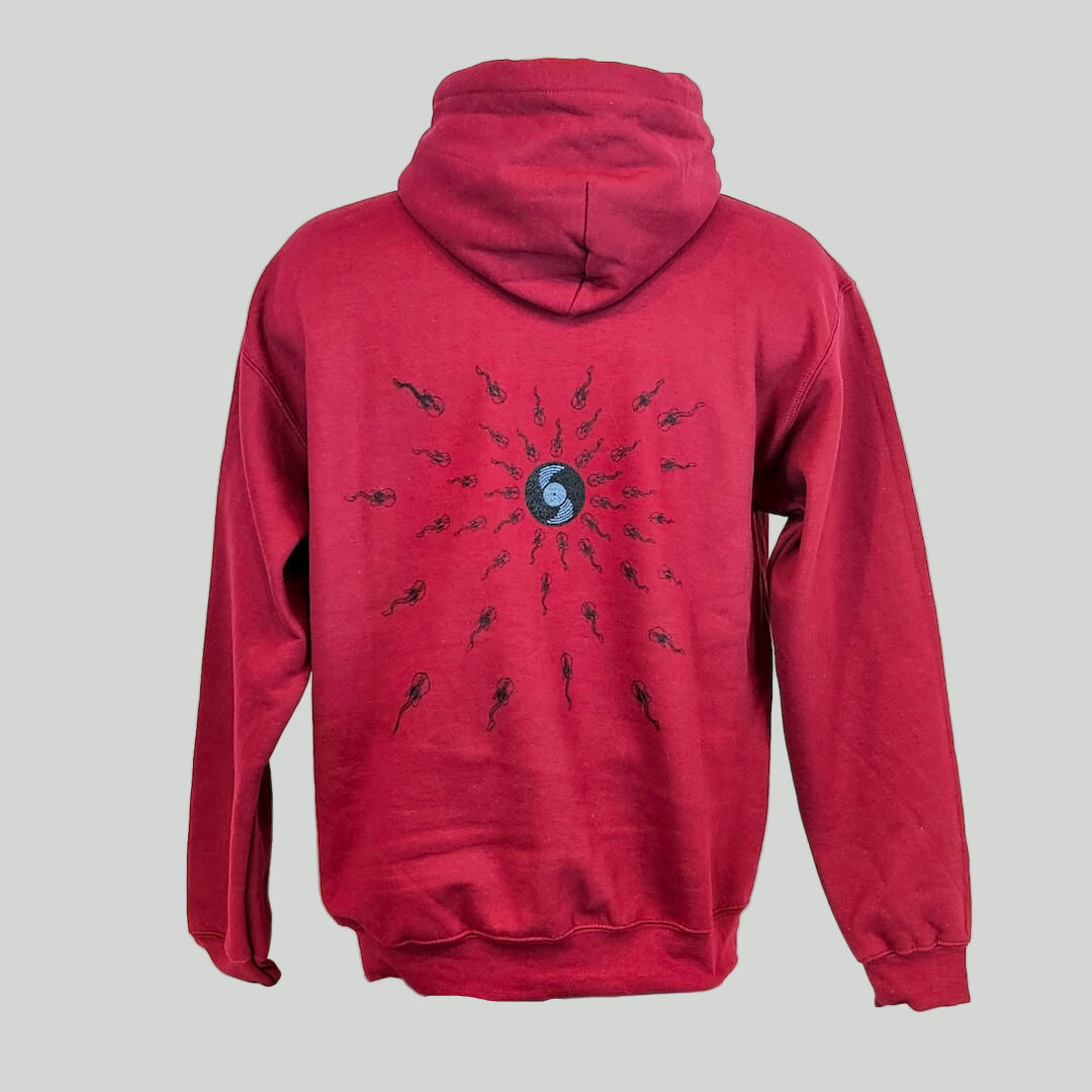 Red hoodie with a black design on the back against a white background