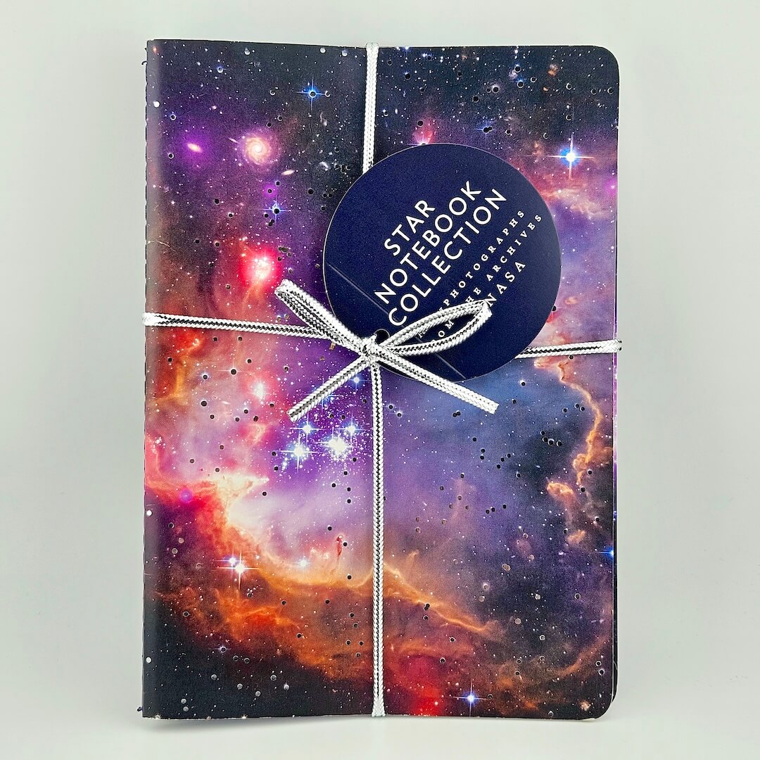 Star notebook collection with galaxy design and NASA label on a white background
