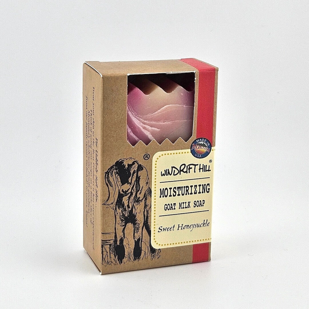 Box of Windrift Hill moisturizing goat milk soap on a gray background