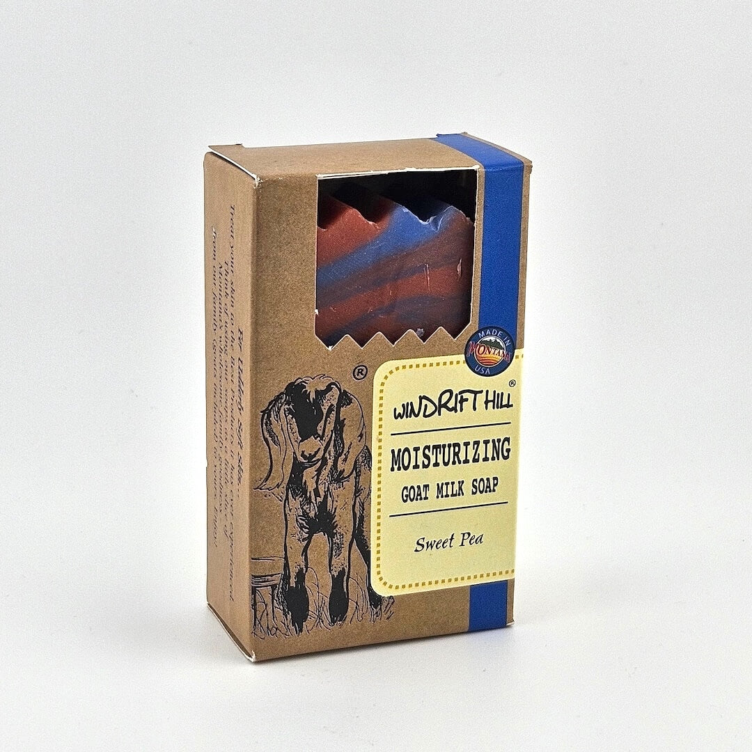 Box of Windrift Hill moisturizing goat milk soap on a gray background