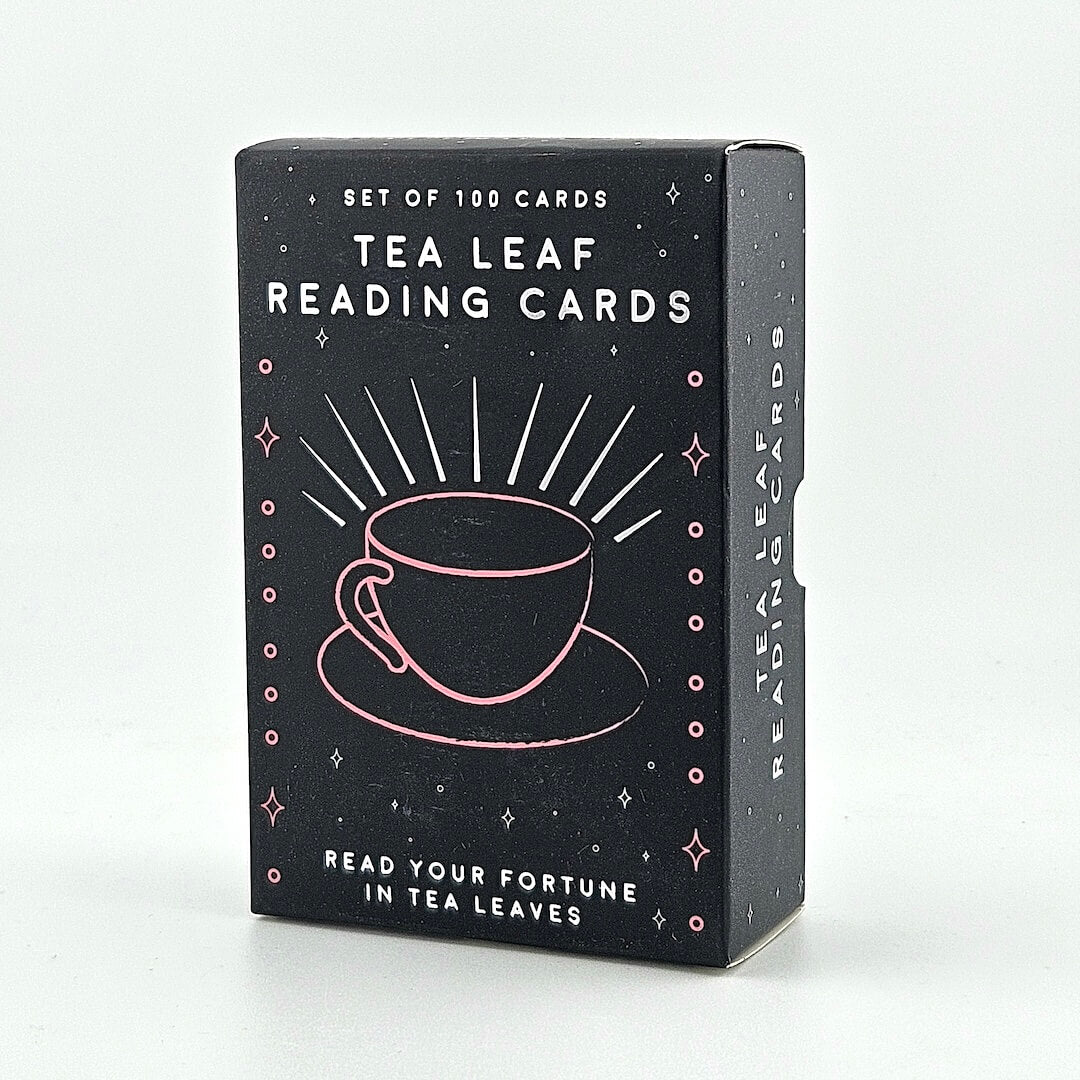 Black box of Tea Leaf Reading Cards with teacup illustration and text against white background