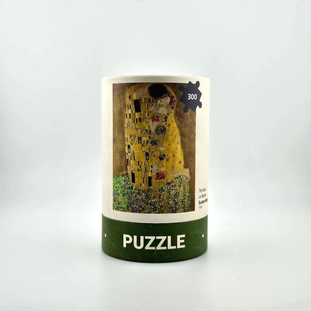 Puzzle box with 'The Kiss' artwork by Gustav Klimt on a white background