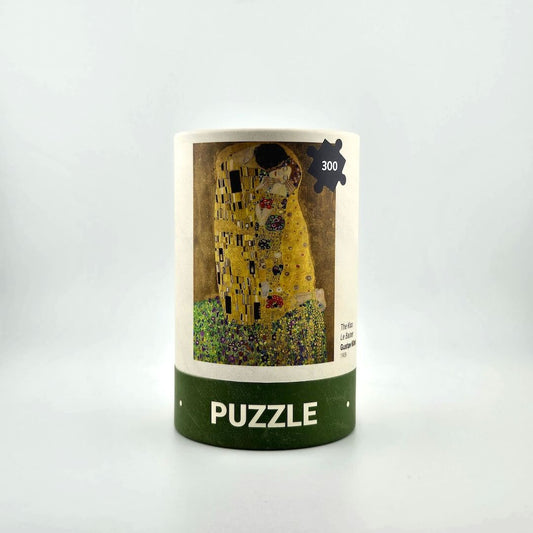Puzzle box with 'The Kiss' artwork by Gustav Klimt on a white background