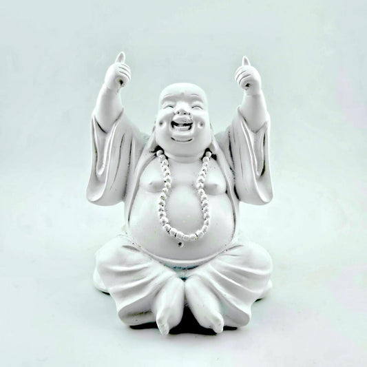White laughing Buddha statue on a light gray background