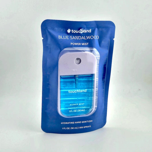 Blue sandalwood power mist packaging with 'touchland' branding on a white background
