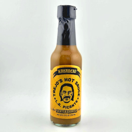 Bottle of Trejo's Hot Sauce with a yellow label on a white background