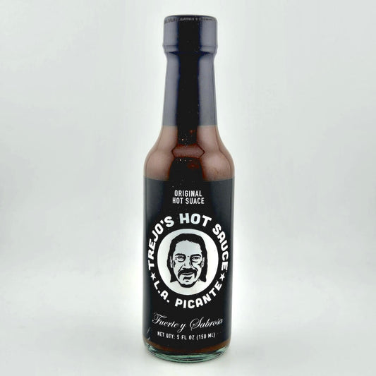 Bottle of Trejo's Hot Sauce on a white background