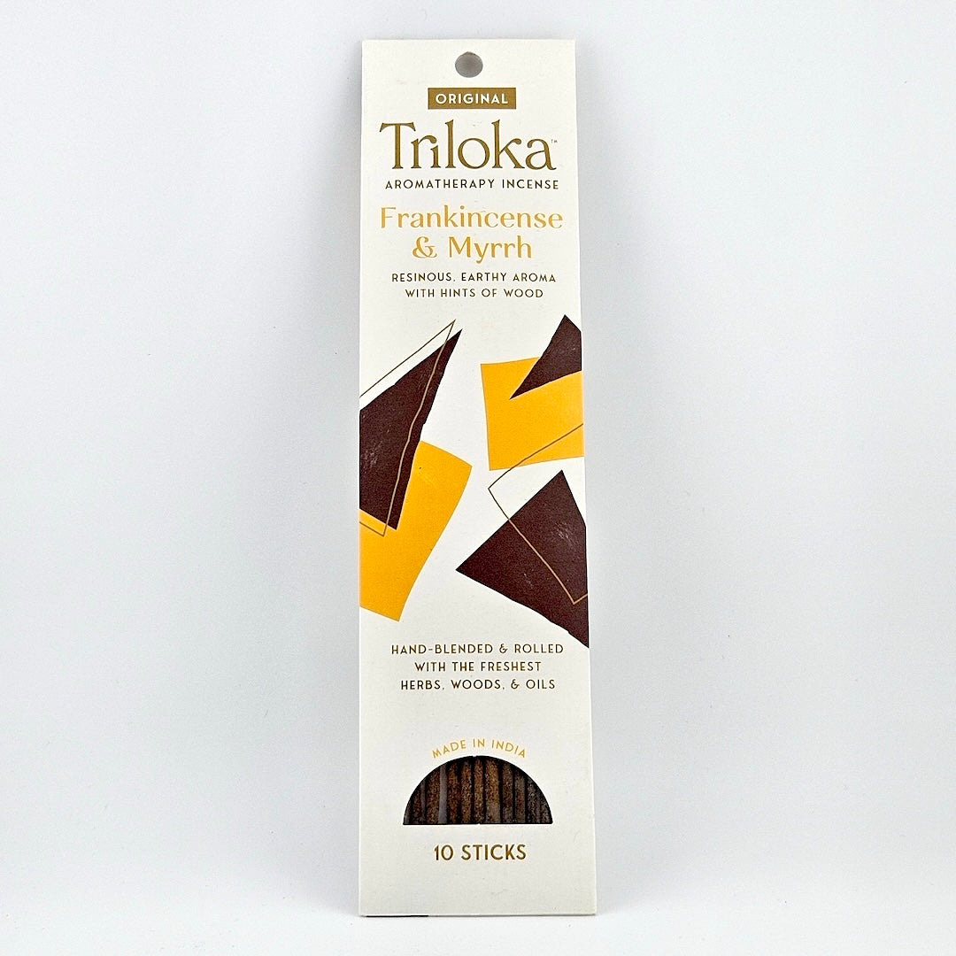 White rectangular package for 10 incense sticks, three leaves in center framed by product information.