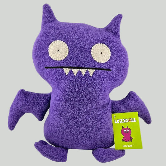 Purple Uglydoll Ice Bat plush toy with a tag on a white background