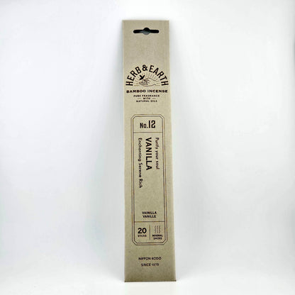 Gray rectangular package of incense with brown text describing product. 