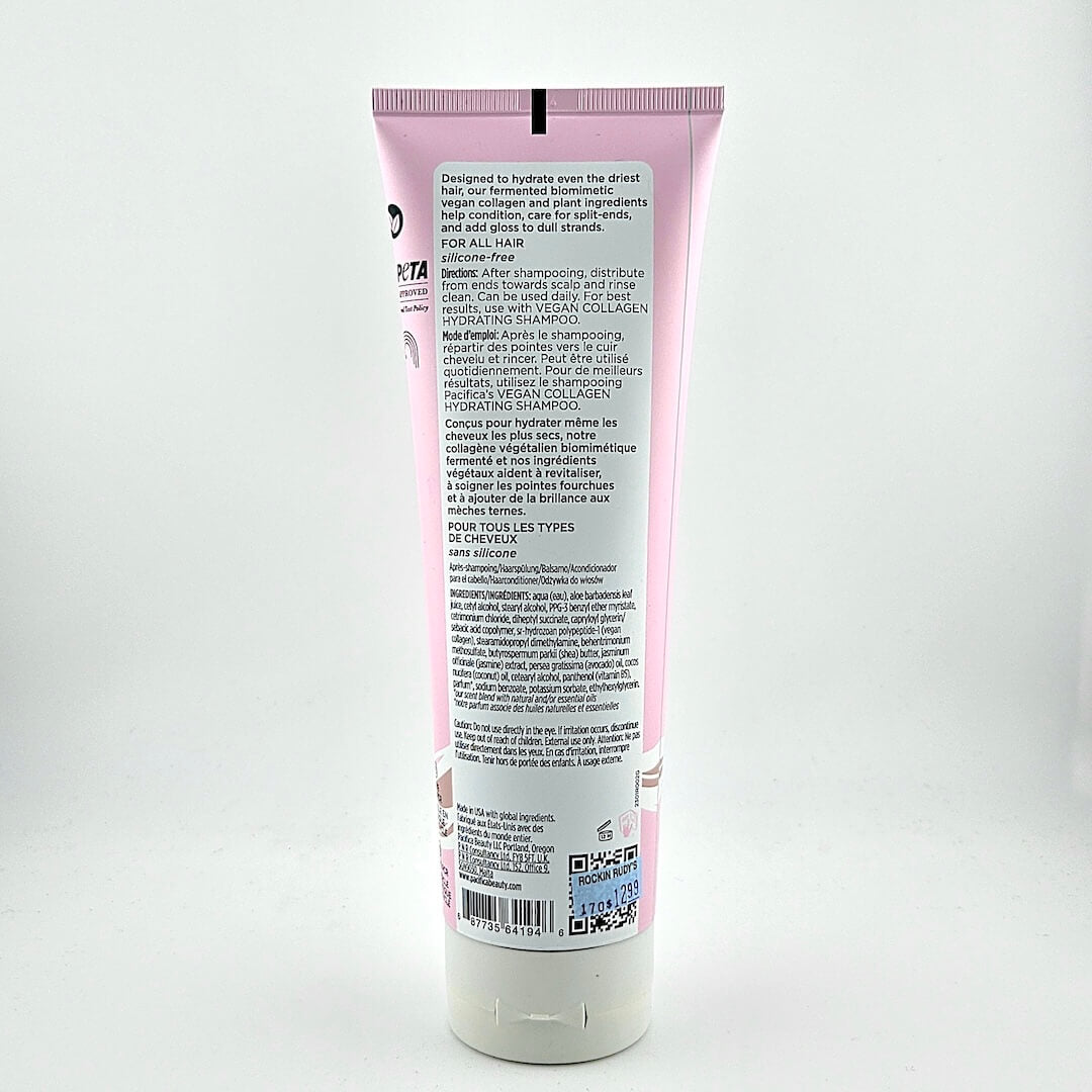 Back view of a pink shampoo bottle with text on a white background
