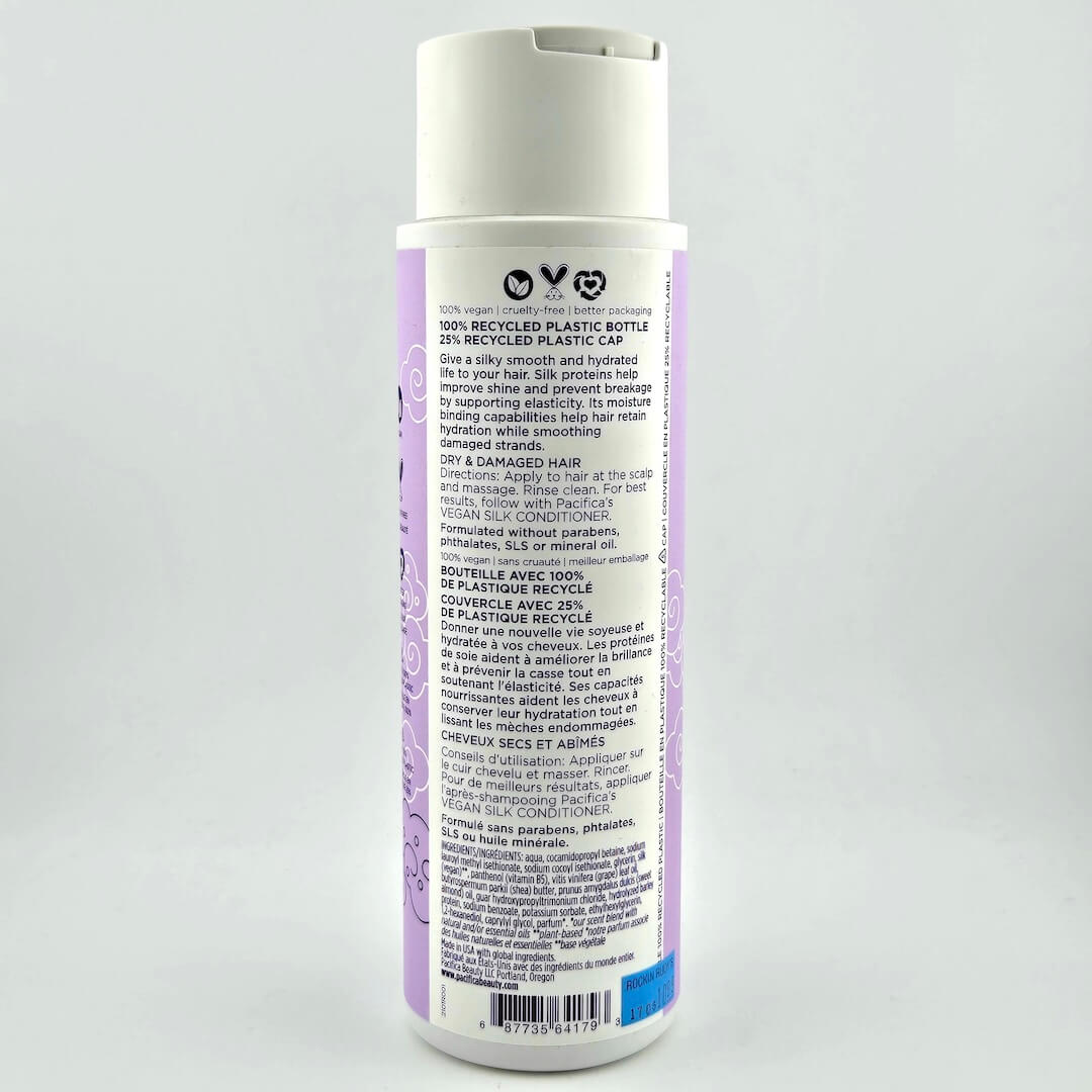 Back label of a shampoo bottle on a gray background
