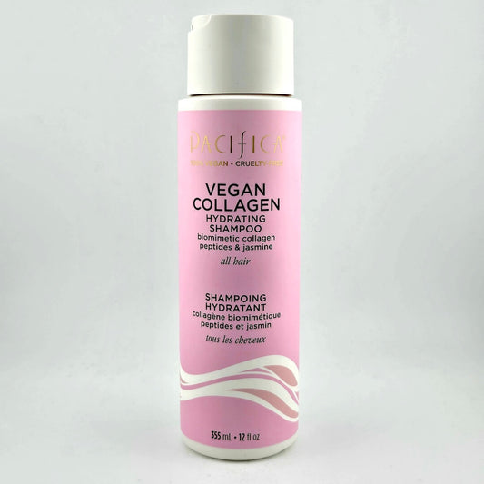 Pink shampoo bottle with white cap on a light gray background