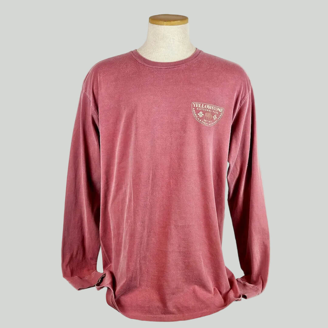 Red long-sleeve shirt with a logo on a mannequin against a white background