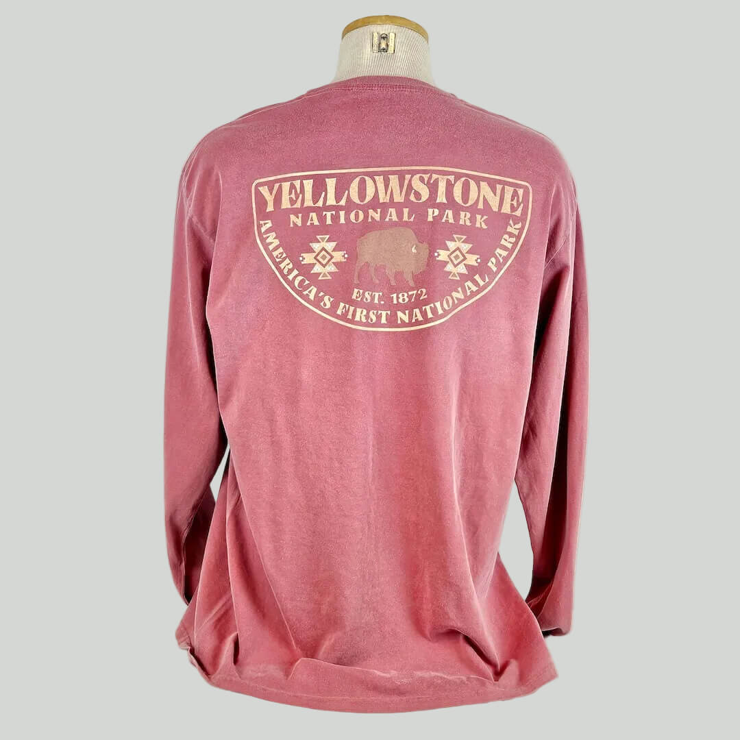 Red long-sleeve shirt with Yellowstone National Park logo on a mannequin against a white background