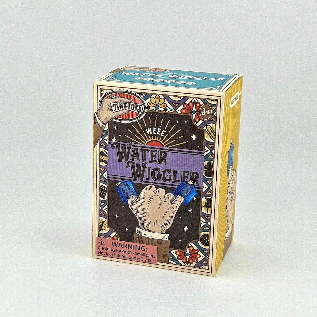Multicolored packaging for "Weee Water Wiggler" against gray background. 