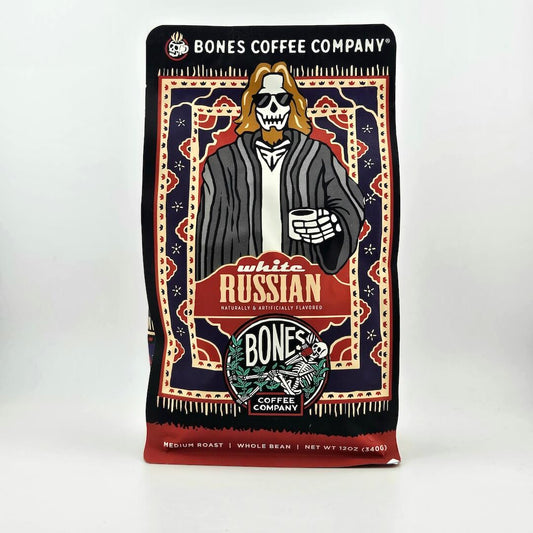 Coffee bag from Bones Coffee Company with a skeleton character holding a coffee cup on a white background