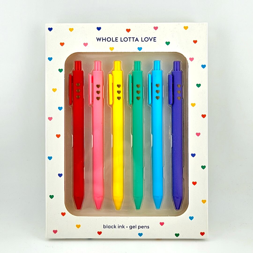Set of five colorful gel pens in a package with 'Whole Lotta Love' text on a heart-patterned background.